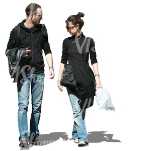 couple wearing jeans walking and talking