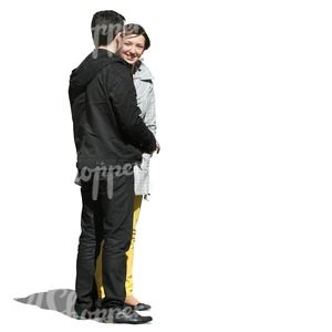 man and woman standing and smiling