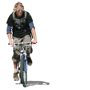 teenage boy riding a bike