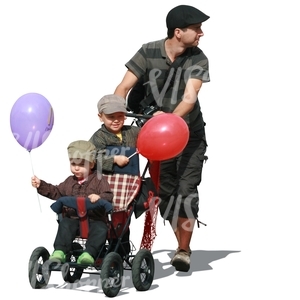 man pushing a baby stroller with two boys in it