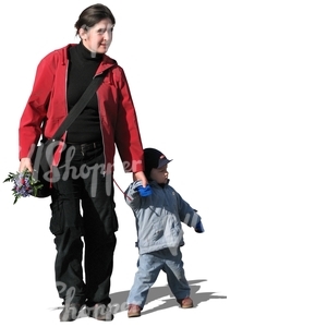woman with flowers holding his son by the hand