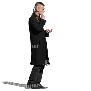 man standing and smoking