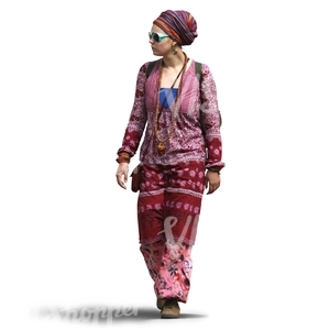 woman in a pink bohemian outfit walking