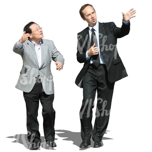 two businessmen walking and talking