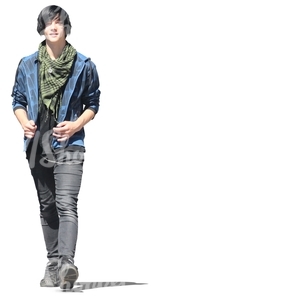 teenage boy in rock style outfit walking