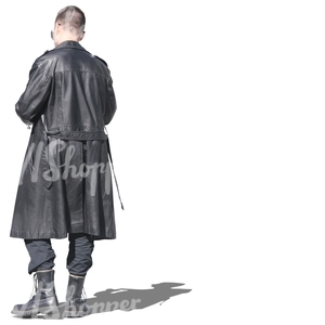 man in a black leather coat standing