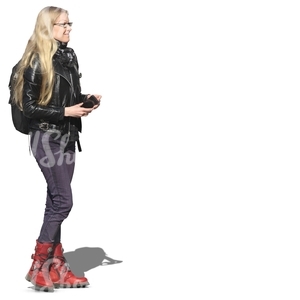 blonde woman in a leather jacket standing