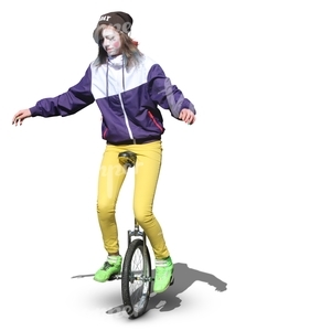 street artist riding a monocycle