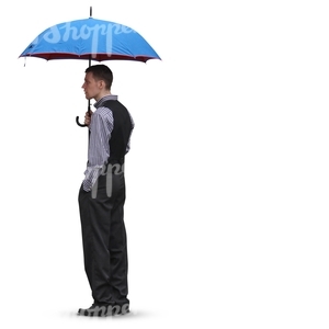 man in a suit standing uder an umbrella