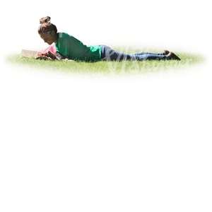 woman lying on the grass and reading a book