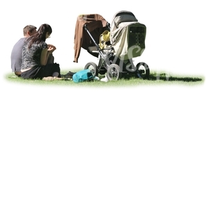 man and woman with a baby carriage sitting on the grass