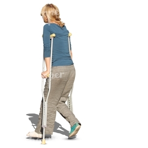 woman walking with crutches