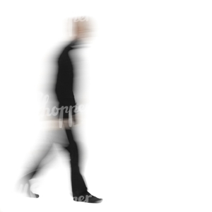 motion blur image of a man in black outfit walking