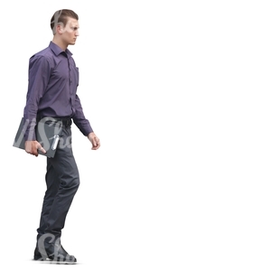 young businessman walking and holding a notepad in his hand