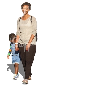 black woman with a child walking and smiling