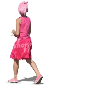 girl in a pink shirt and skirt walking