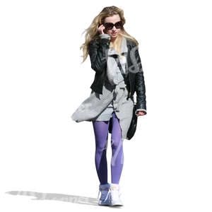 young woman with long blond hair walking and talking on the phone