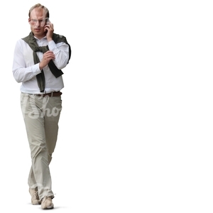 man with glasses walking and talking on the phone