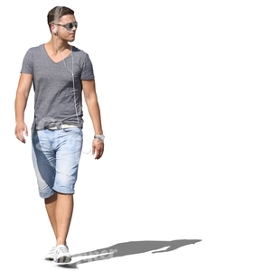 man walking and listening to music