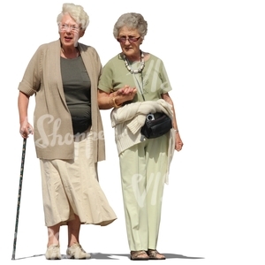 two elderly women walking hand in hand