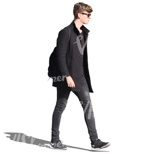 young man in black walking