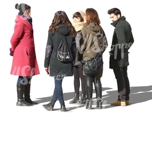 four women and one man standing in circle