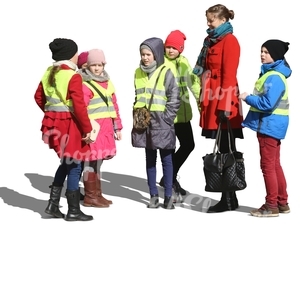 schoolchildren and a teacher standing