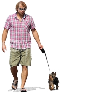 man with sunglasses walking a dog