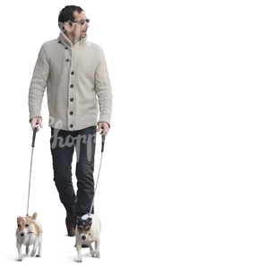 man walking two dogs