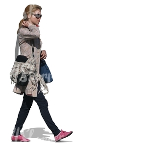 woman in grey spring coat walking