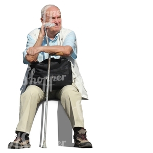 older man with a crutch sitting