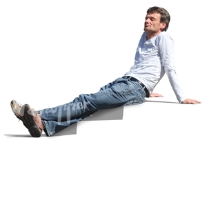 man sitting and enjoying the sun