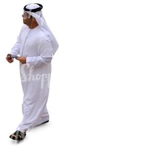 arab man walking and listening to music