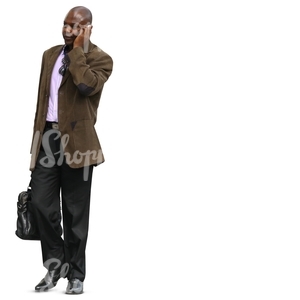 african man walking and talking on the phone