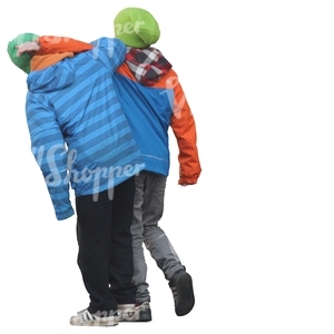 two boys in winter jackets walking playfully