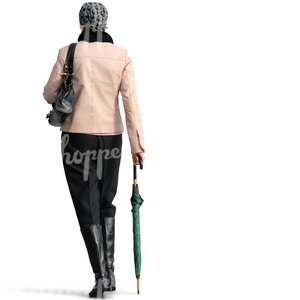 woman with an umbrella walking seen from behind