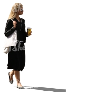 cut out backlit woman in a black dress walking