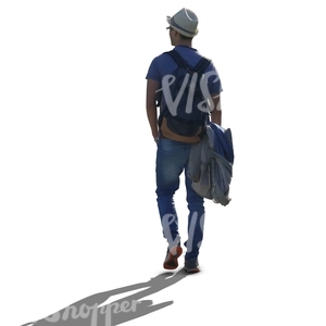 backlit man with a hat walking
