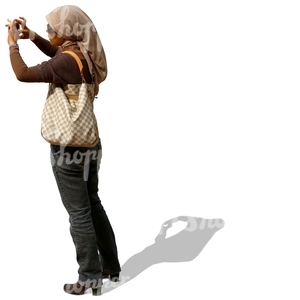 muslim woman taking a picture