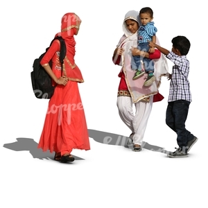 two hindu women with two boys walking