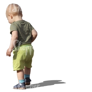 toddler in green pants walking