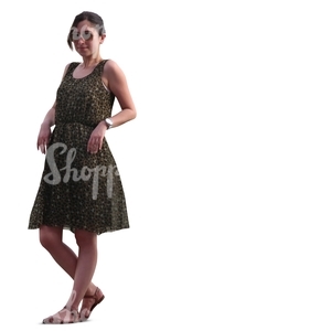 woman standing and leaninig against a railing