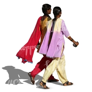 two hindu women wearing colorful indian clothing walking and talking