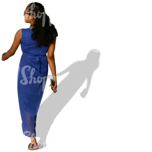 woman in a blue dress walking