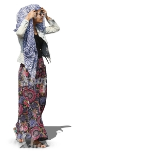 indian woman wrapping a scarf around her head