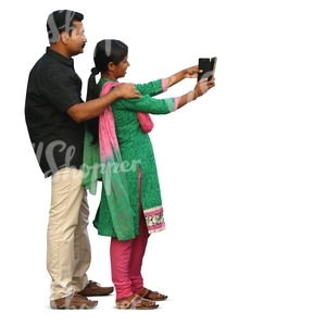 indian couple standing and taking a selfie
