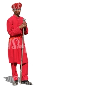 hindu man wearing a red suit and turban standing
