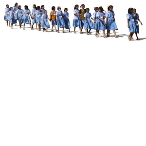 group of indian schoolgirls walking in a row