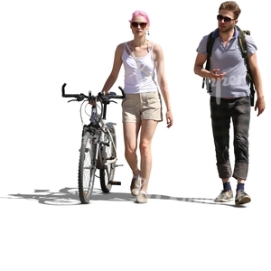 man walking with a woman who has a bike