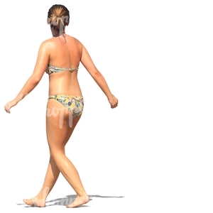 woman in a bikini walking on the beach
